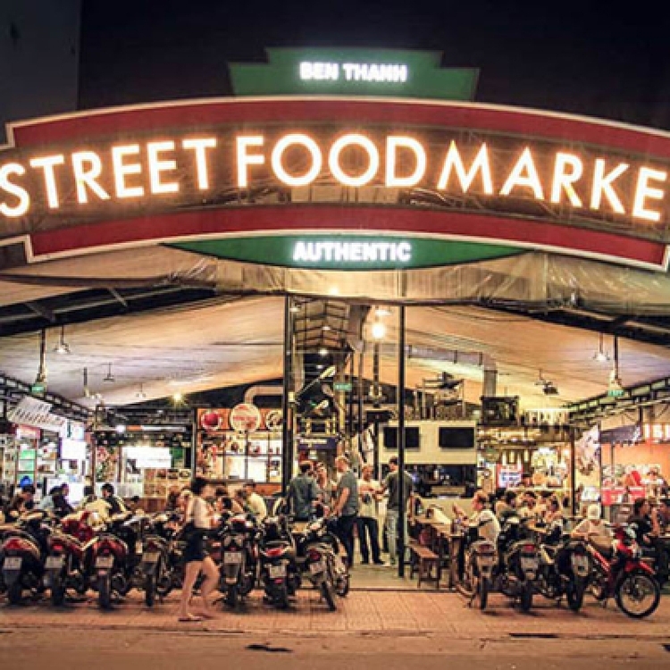 Explore Saigon's Best Street Food and Culture Private Motorbike Night Tour