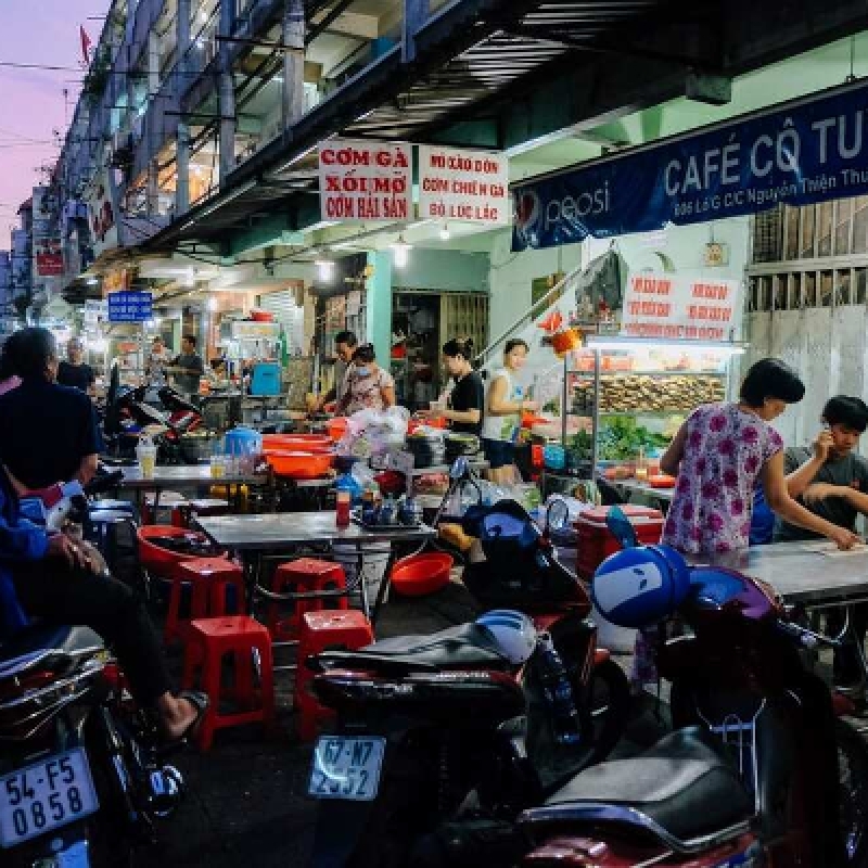 Explore Saigon's Best Street Food and Culture Private Motorbike Night Tour 3