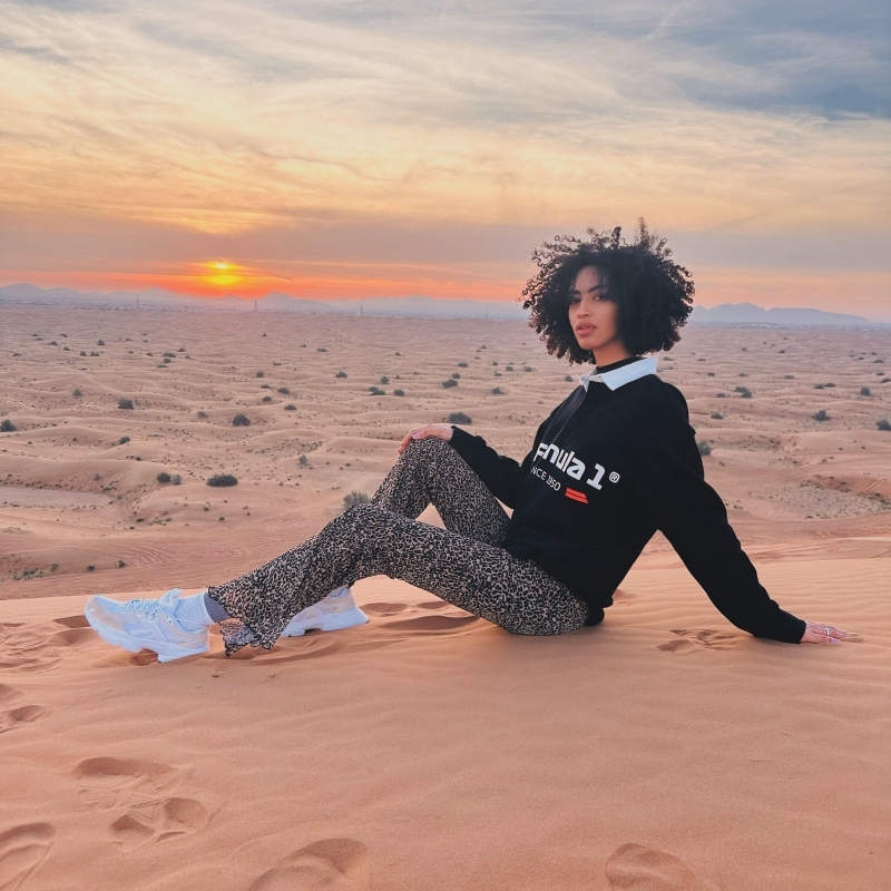 Evening Desert Safari with Camel Ride Sandboard & BBQ Dinner 5