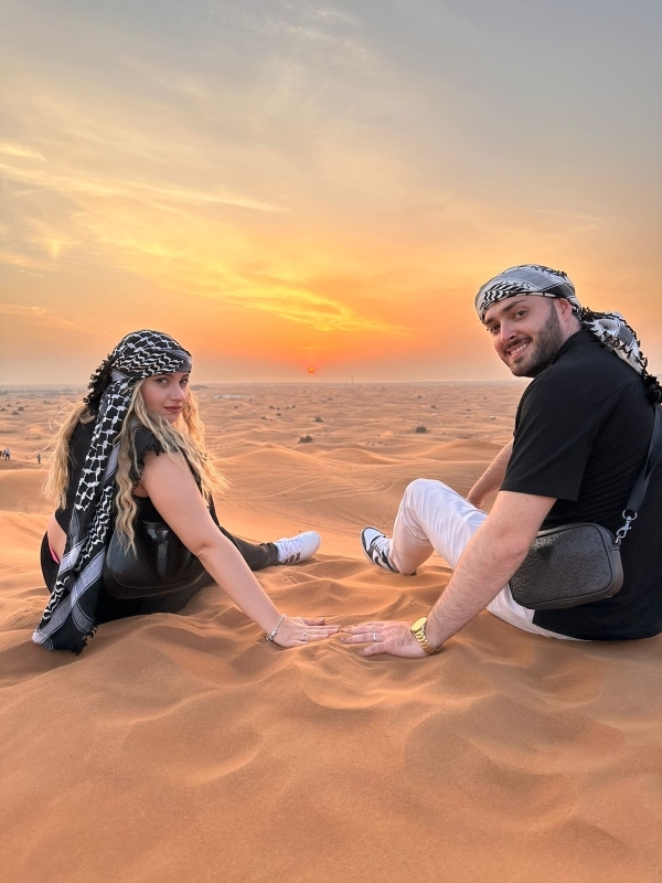 Evening Desert Safari with Camel Ride Sandboard & BBQ Dinner 1