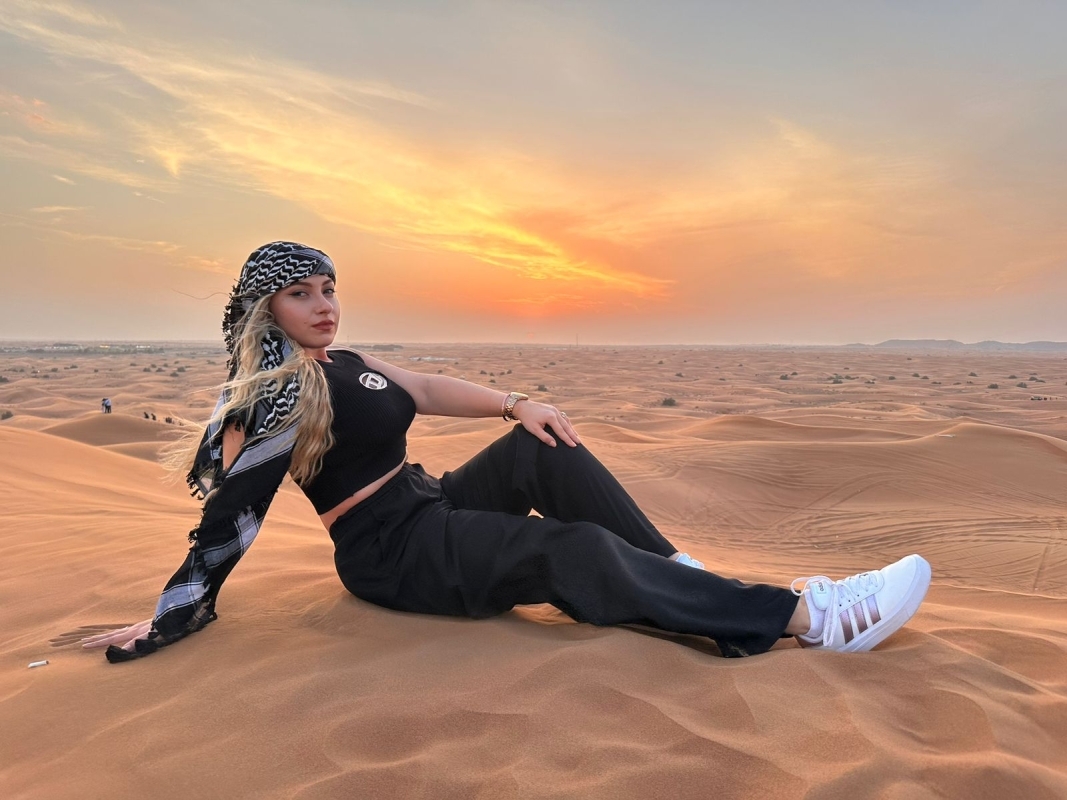 Evening Desert Safari with Camel Ride Sandboard & BBQ Dinner 3
