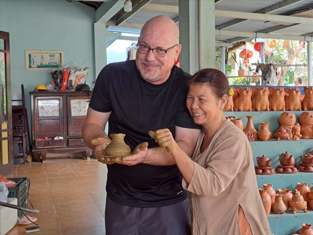 Explore Hidden Hanoi & Bat Trang Pottery Village by Vintage Jeep 3