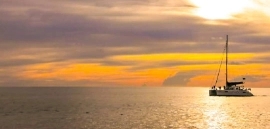Sunset Promthep + Coral by Yacht catamaran
