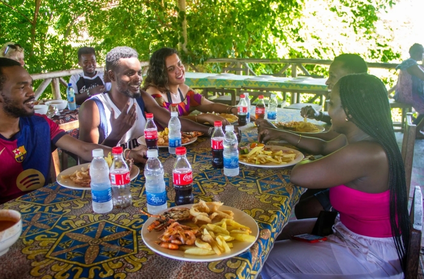 Mnemba Island Snorkeling, Dolphin Watching & Stone Town Tour 4