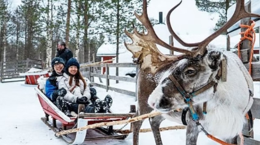 Santa Claus Trip with Husky and Reindeer Sleigh and Snowmobile 1
