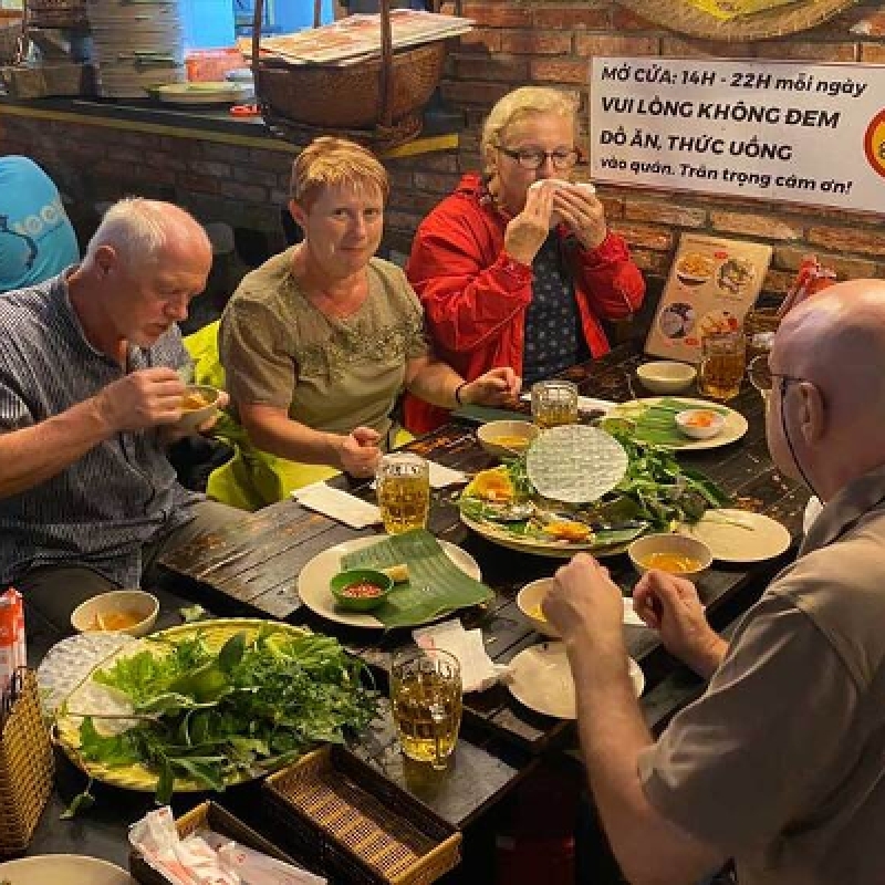 Explore Saigon's Best Street Food and Culture Private Motorbike Night Tour 2