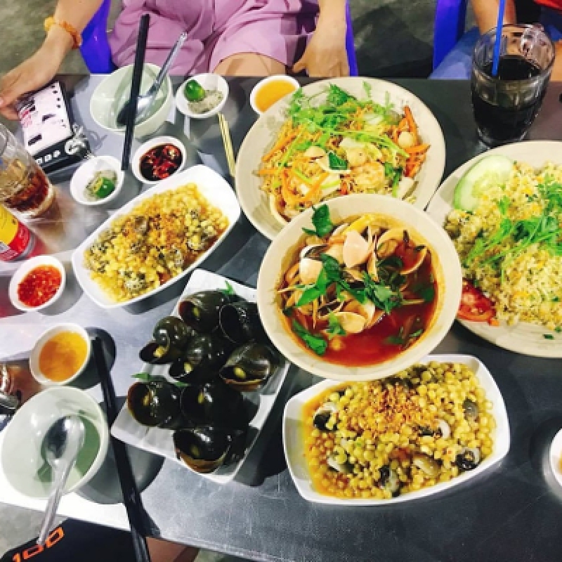 Explore Saigon's Best Street Food and Culture Private Motorbike Night Tour 7
